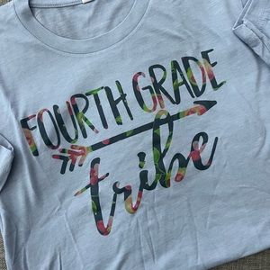 Fourth grade teacher shirt; size small; worn once; light blue